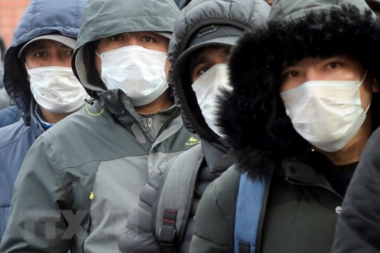 ttxvn-covid19-who-khuyen-khich-dung-khau-trang-de-han-che-su-lay-lan-virus-105725446-4574468