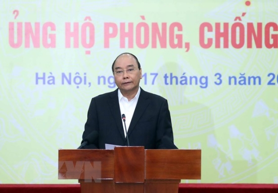 ttxvn-thu-tuong-nguyen-xuan-phuc-du-le-phat-dong-toan-dan-ung-ho-phong-chong-dich-covid19-112209494-4520622