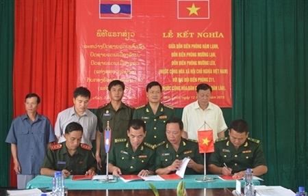 Lễ ký kết giữa các đồn Biên phòng tỉnh Sơn La với Đại đội 211 nước CHDCND Lào