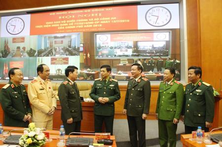 Bộ Quốc phòng và Bộ Công an giao ban thực hiện Nghị định số 77 của Chính phủ
