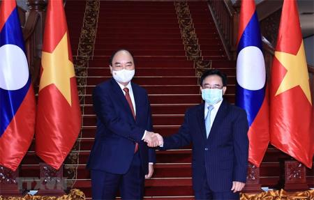 Chủ tịch nước Nguyễn Xuân Phúc hội kiến Thủ tướng Chính phủ Lào
