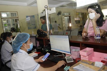 Nỗ lực chuyển đổi số để nâng cao hiệu quả bảo hiểm xã hội, bảo hiểm y tế
