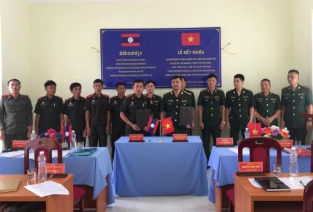 Đồn Biên phòng Mường Nhà và Đồn Biên phòng cửa khẩu Huổi Puốc ký kết nghĩa với Đại đội Biên phòng 163, Lào